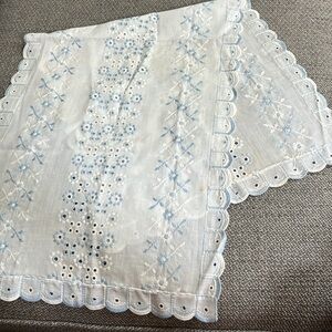 Sweet vintage embroidered baby blue and white runner.